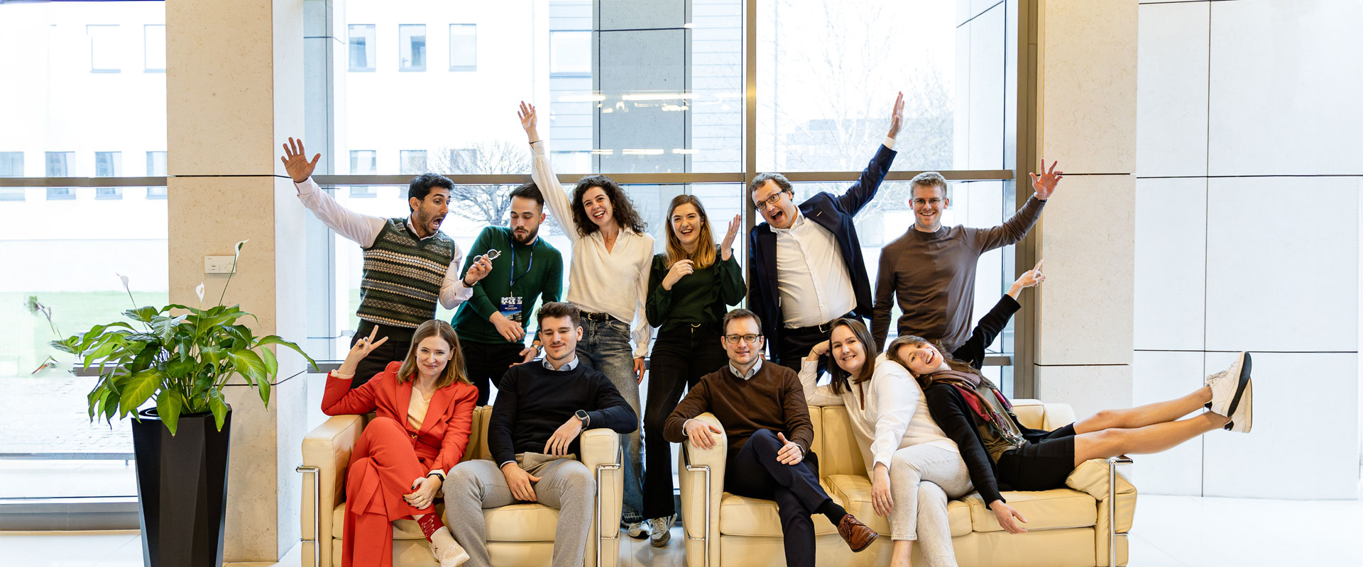 People smiling, posing, team.