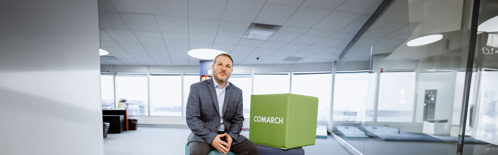 One man posing in the Comarch office.