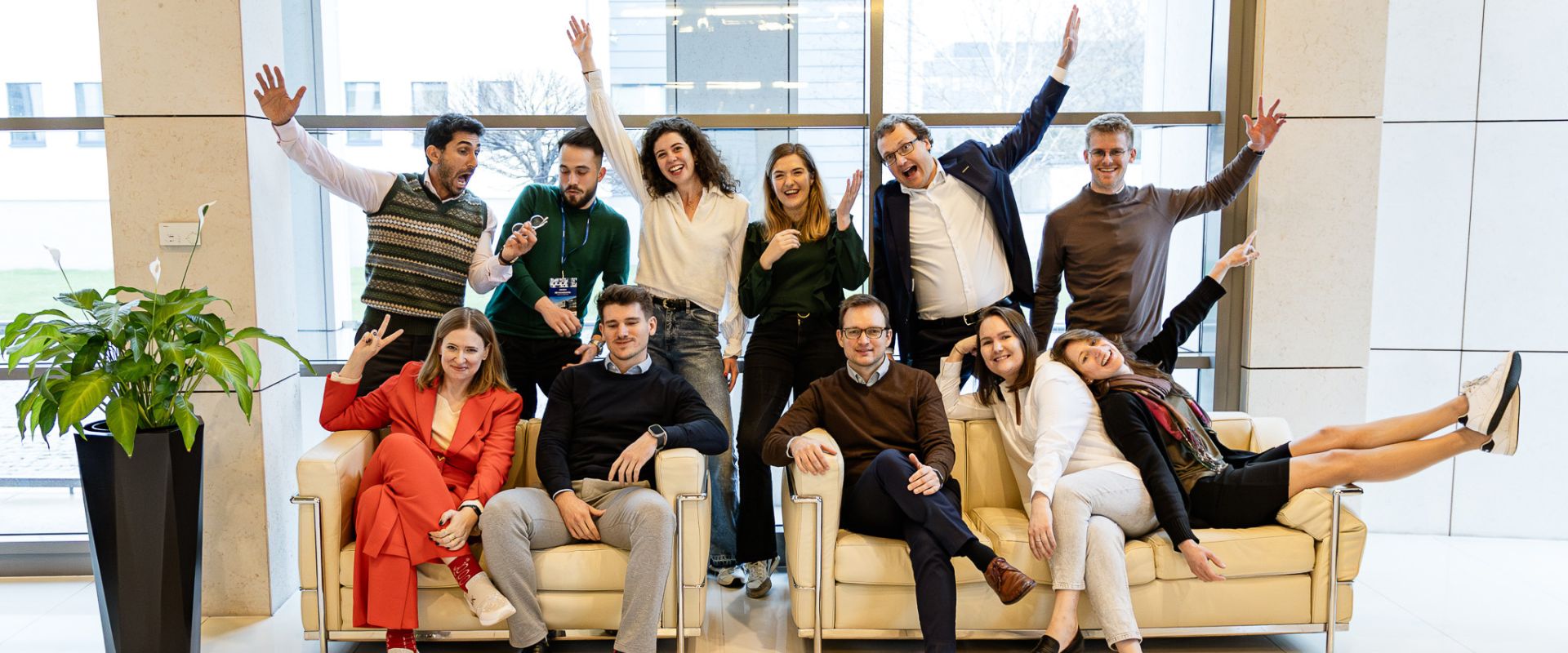 People smiling, posing, team.