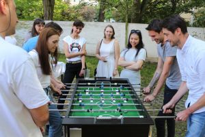 dresden team playing table footbal during the integration party